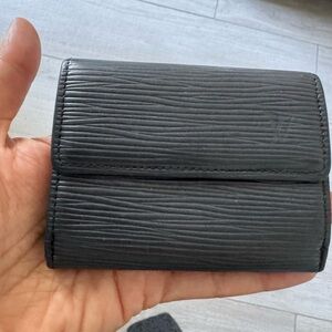 Louis Vuitton card wallet.